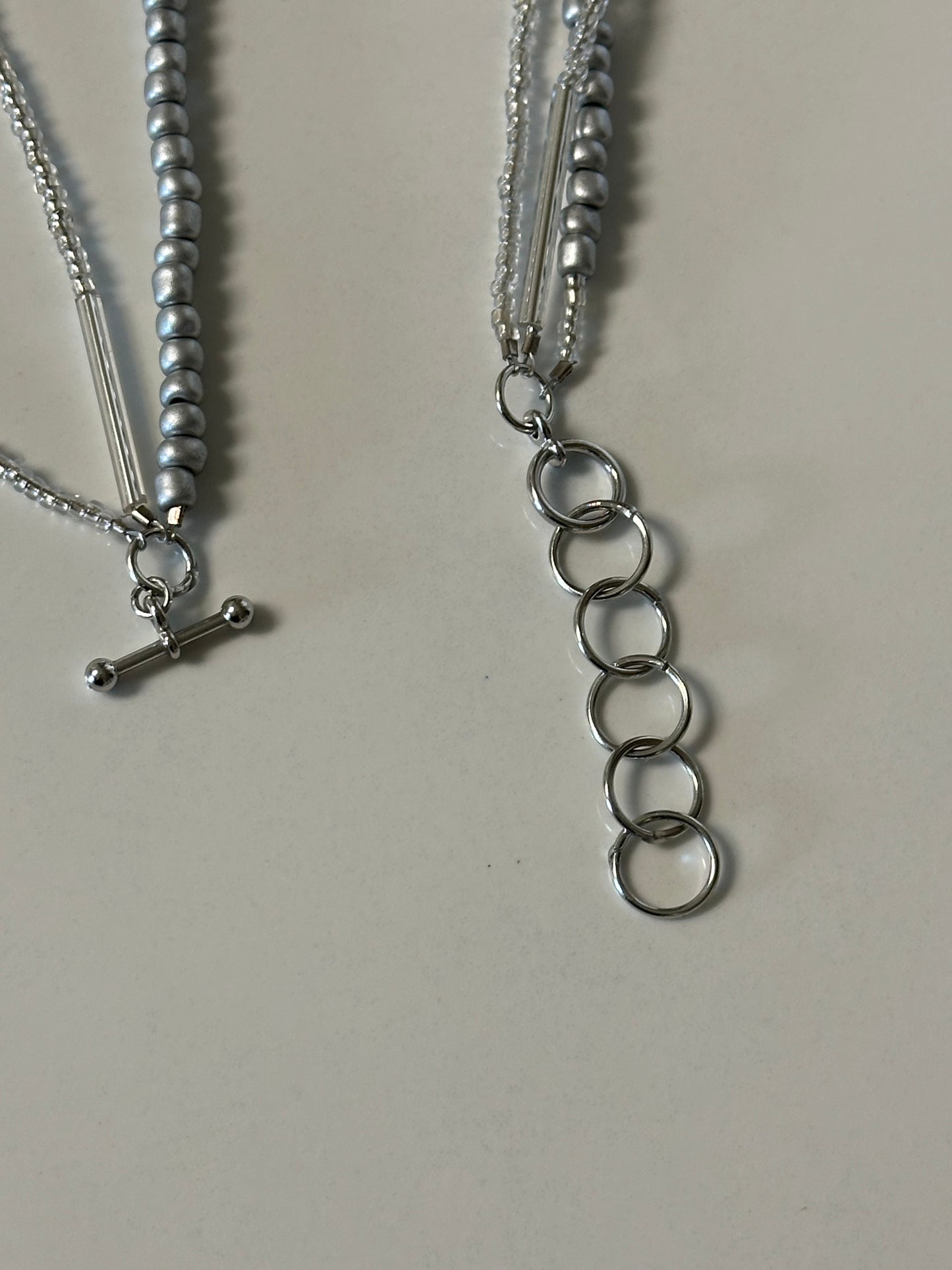 three-strand silver orchid necklace