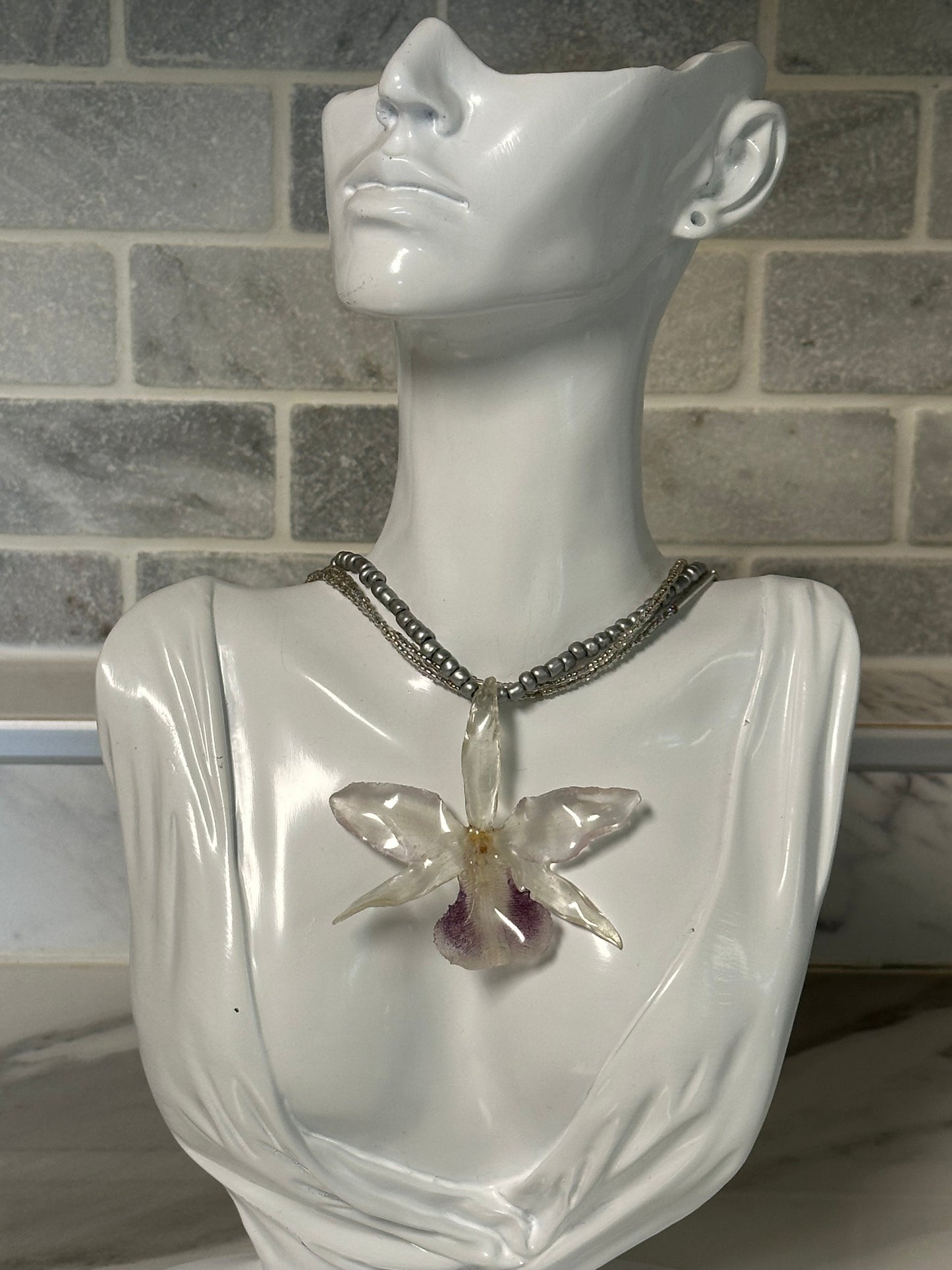 three-strand silver orchid necklace