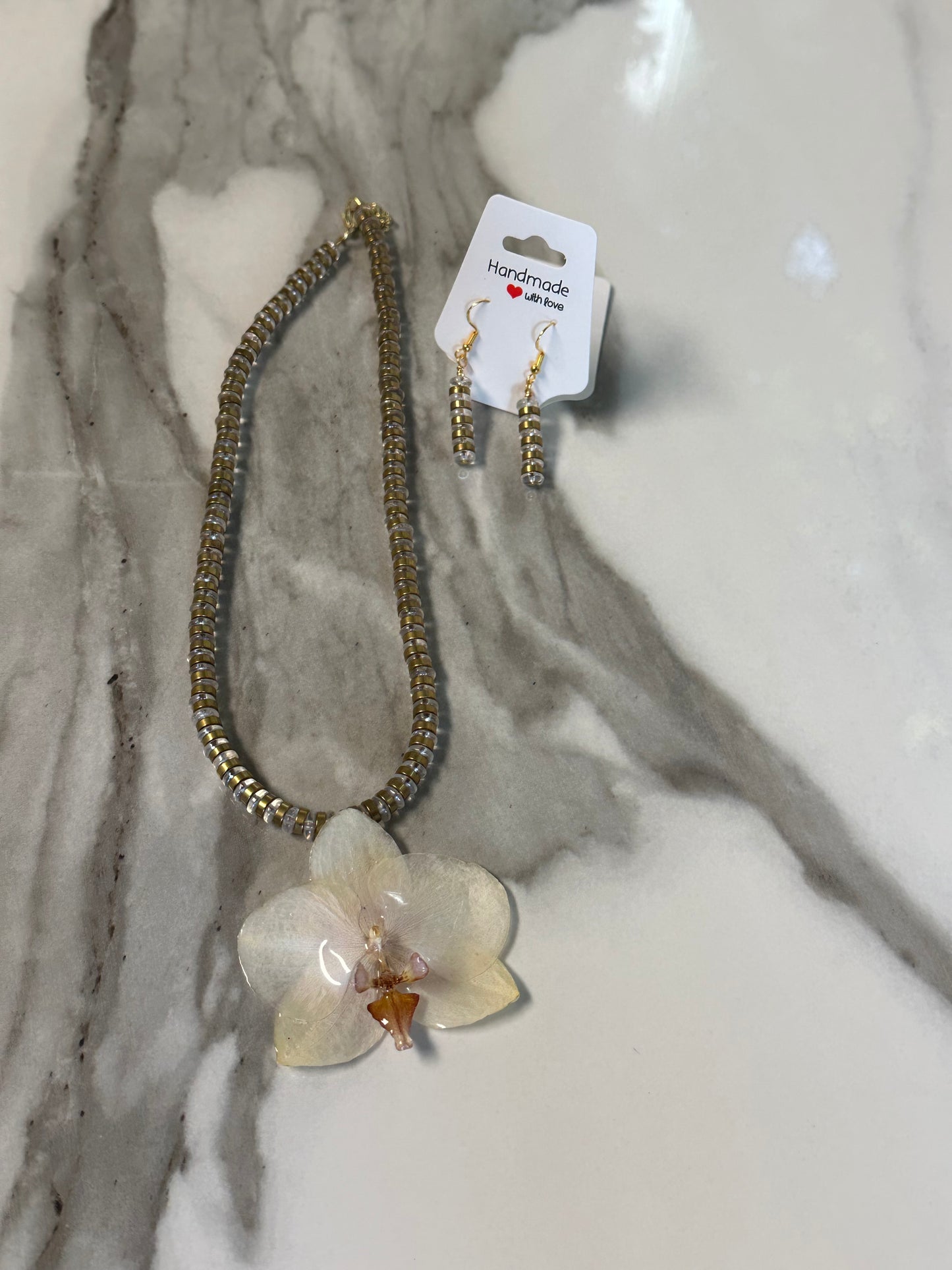 orchid brass necklace with earrings