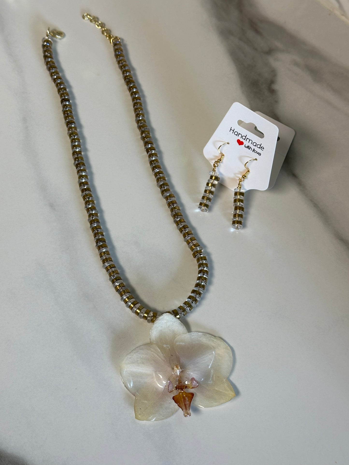 orchid brass necklace with earrings