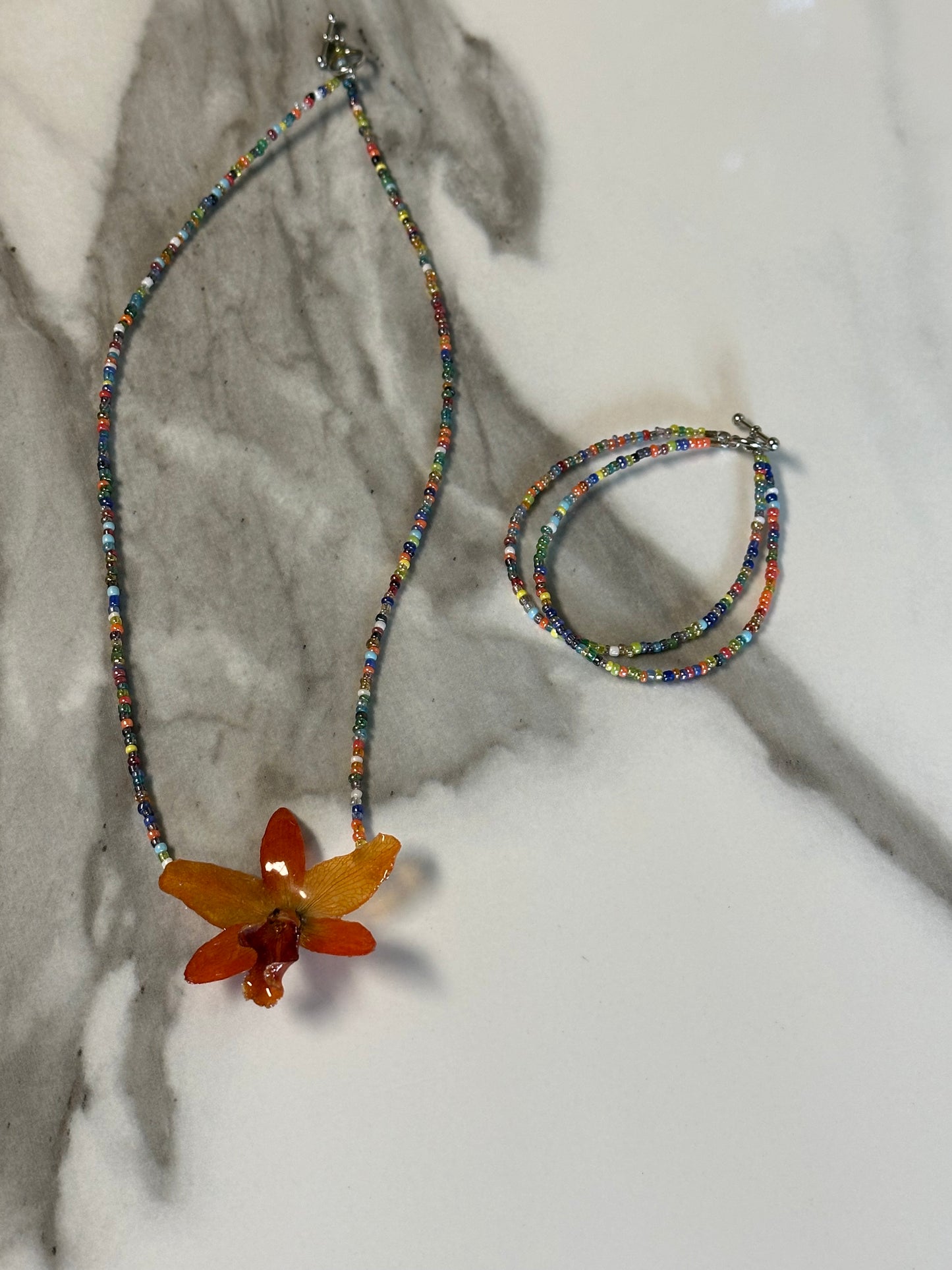 orange  cattleya necklace with bracelet